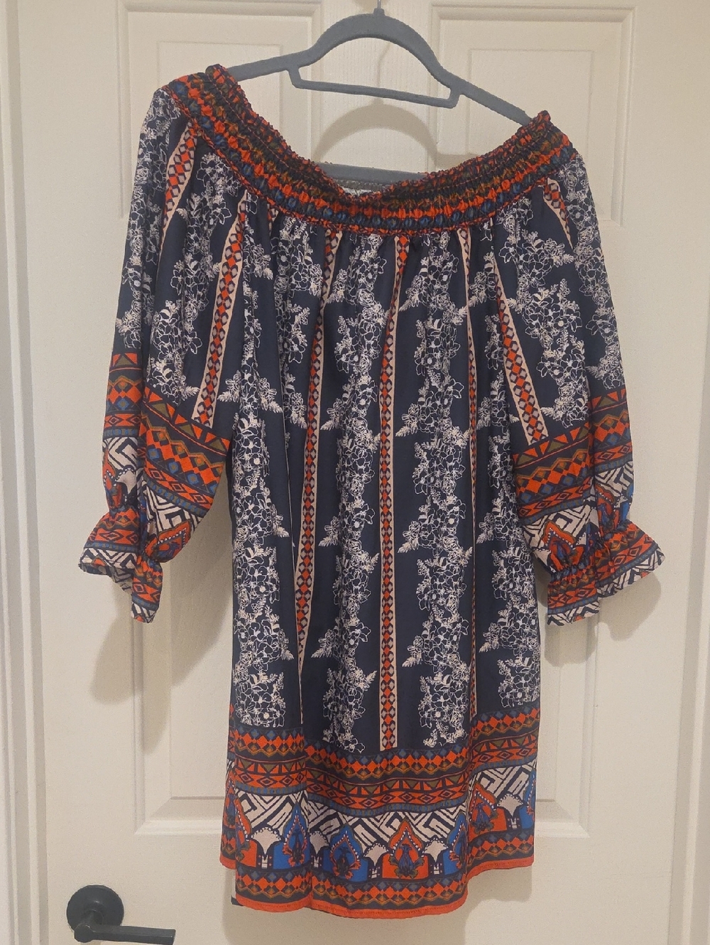 Chelsea & Violet Light Blue Top with Orange Tag Accent
